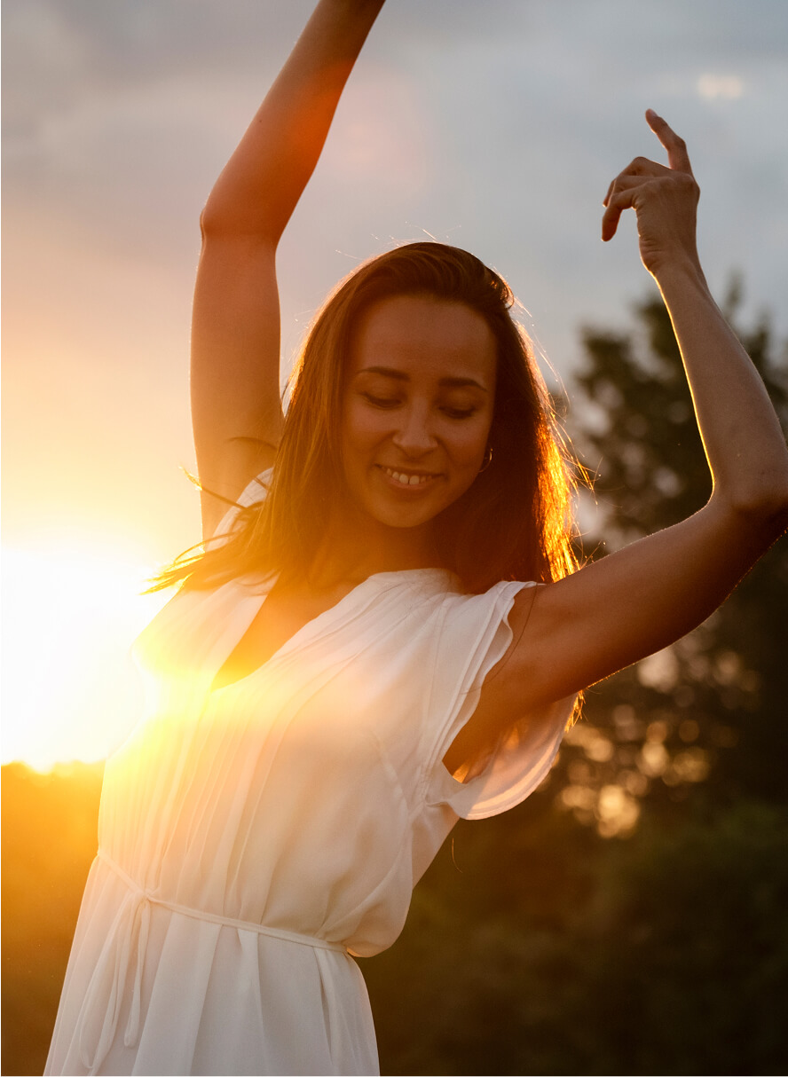 Happy 6 Day patient outdoors at sunset